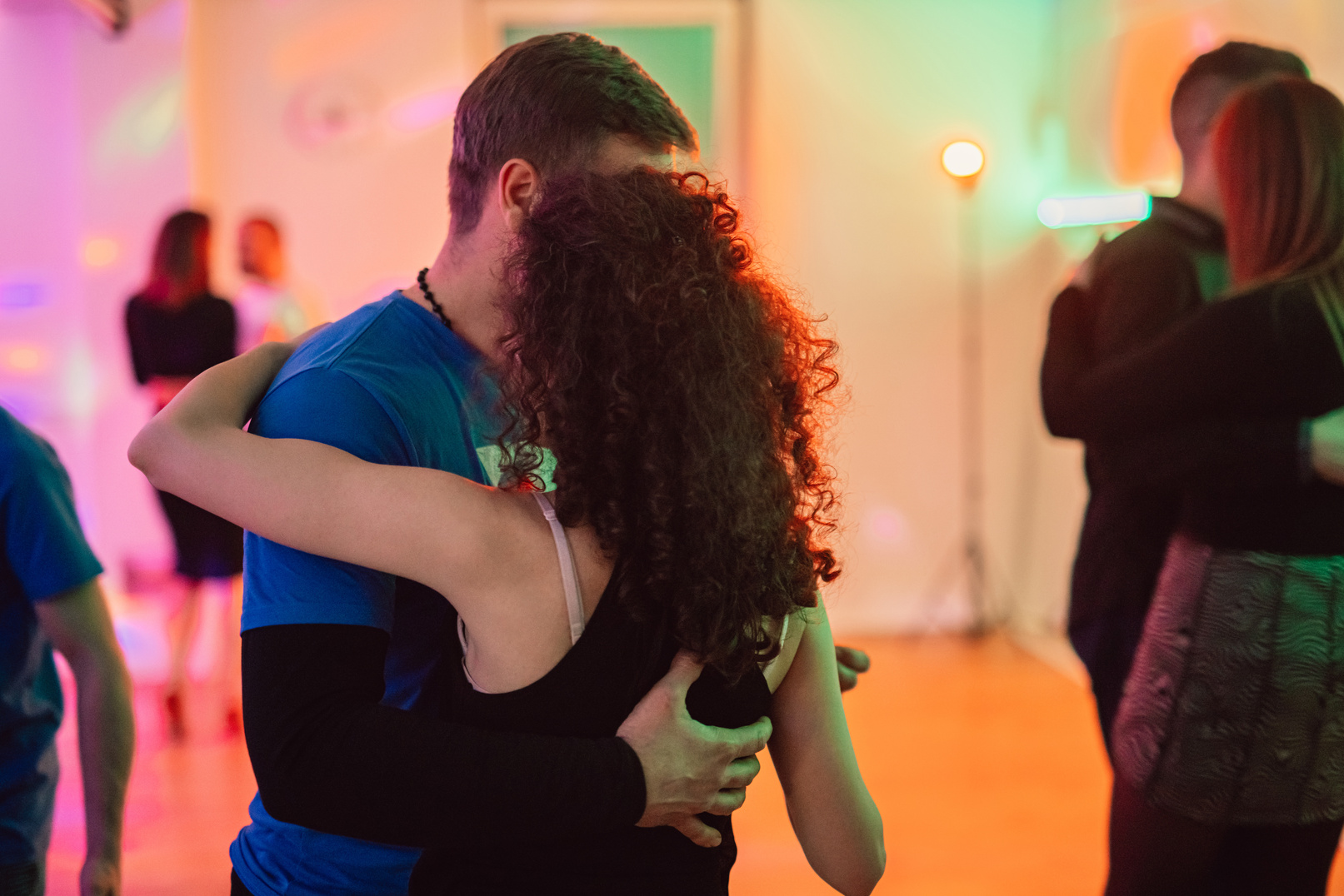 Couple dancing salsa at the party